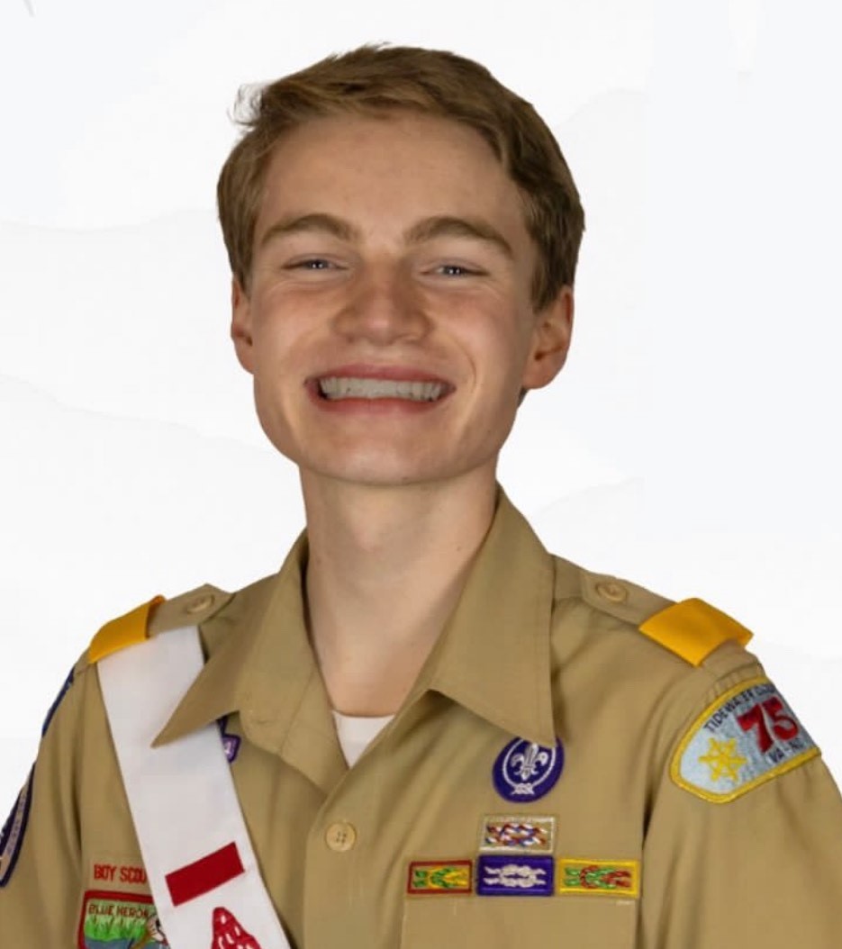 Photo of David Gosik in Scout uniform with OA sash