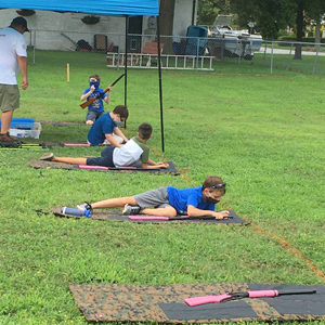 Cub Scouts practicing with BB guns