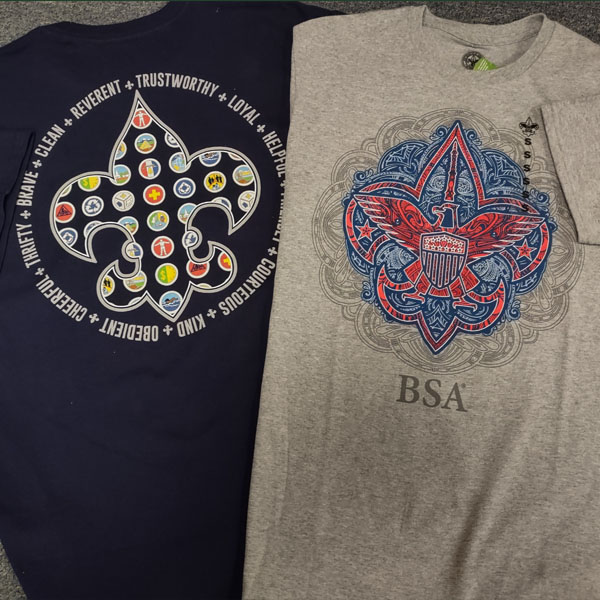 Two t-shirts with fleur-de-lis design