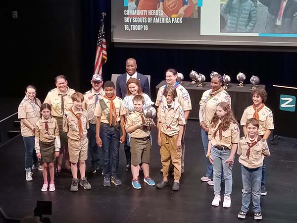 Scouts from Pack 16 and Troop 16 in Virginia Beach receiving a Community Heroes Award from the Coastal Virginia Chamber of Commerce on September 26, 2023