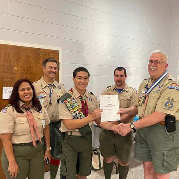 Scout Will T. receiving a National Certificate of Merit