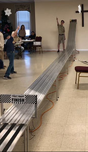 Photo of an aluminum Pinewood Derby track