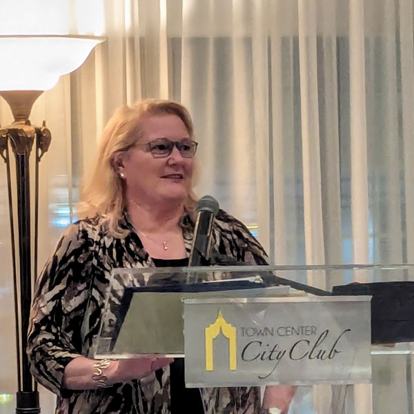 Andrea Kilmer speaking at the Second Annual Examples of Success Event