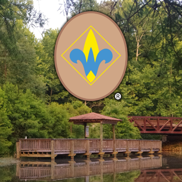 Webelos logo over background of Gene Warber fishing pier
