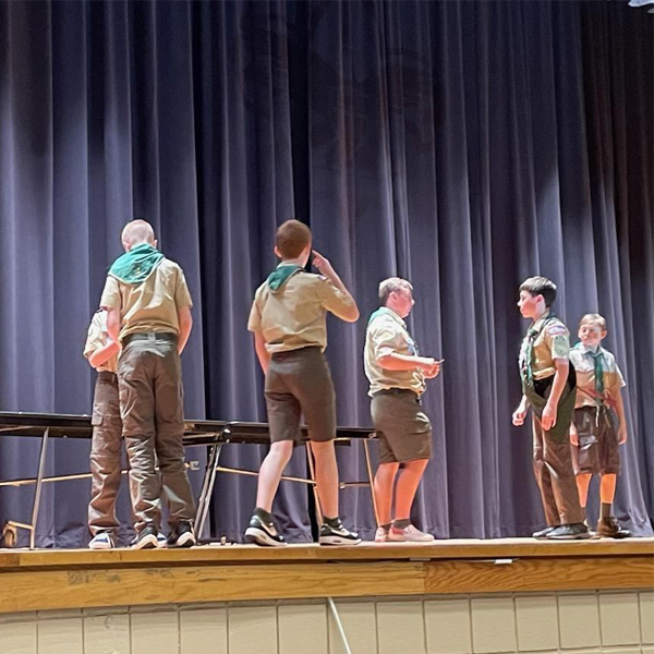 Scouts from Troop 471 receiving awards at a Court of Honor