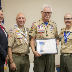 Photo of Scout Executive James Parnell, Council Commissioner Tim Briggs, Living Legend of Tidewater Council Michael Meyer, and Council President John Scheib