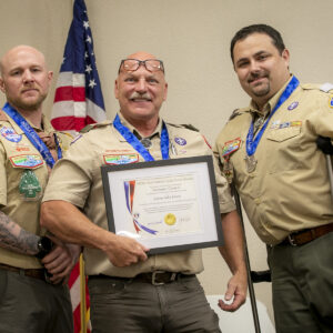 AJ Davis receiving the NESA Outstanding Eagle Scout Award (NOESA) from fellow NOESA recipients Justin Kilmer and Wes Parker