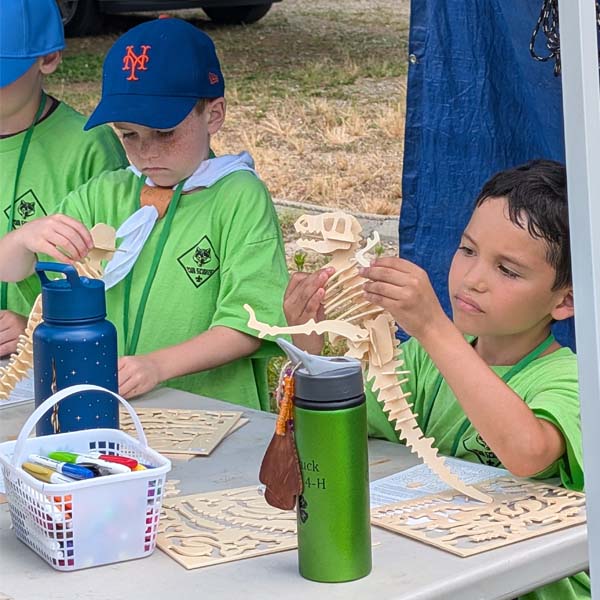 Scouts at craft station at Elizabeth City Day Camp