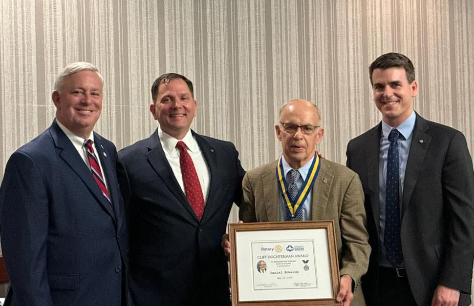 Group photo at presentation of Cliff Dochterman Award to Dan Edwards: (L-R): Hearst Vann – Past President, Rotary Club of Virginia Beach and current member, First Flight Rotary Club; James Parnell – Scout Executive, Tidewater Council Boy Scouts of America; Dan Edwards; Ross Loomis – President, Rotary Club of Virginia Beach