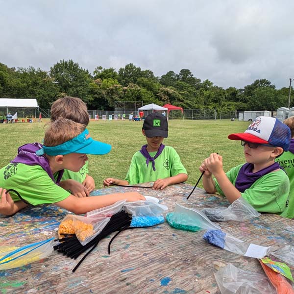 Scouts making crafts at Princess Anne Day Camp