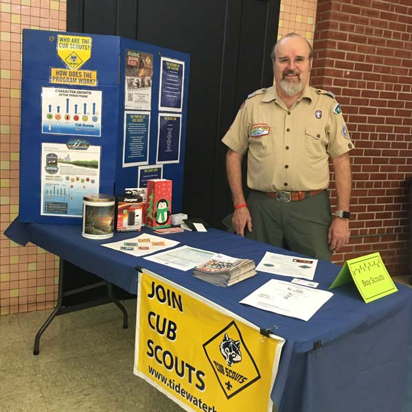 Photo of Tim Roisen at a Cub Scout recruiting booth