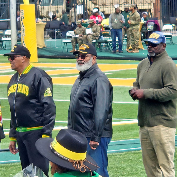 Scout leader JW Washington receiving the Operation Hat Trick Hero Box Award at Norfolk State University on November 16, 2024