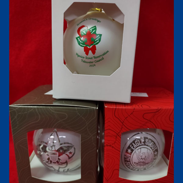 Scouting holiday ornaments: Pipsico Scout Reservation/Tidewater Council 2024, Boy Scouts of America fleur-de-lis, and Eagle Scout logo ornaments