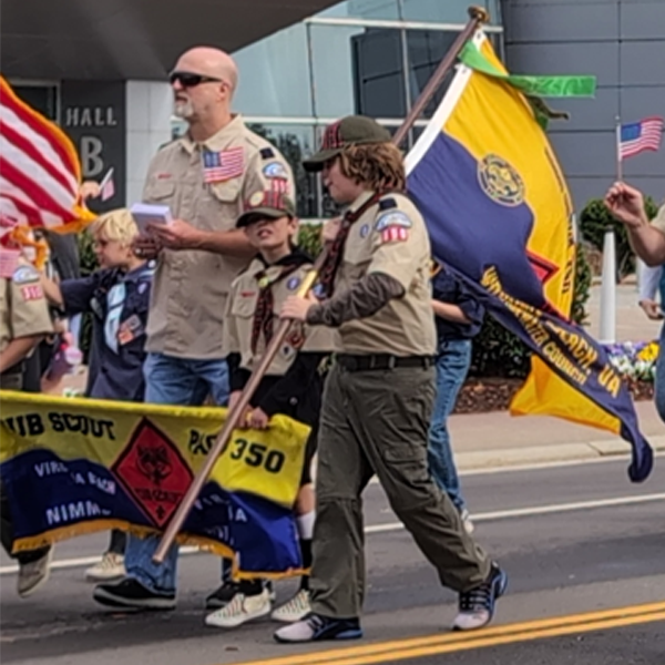 Scouts marching in the Tidewater Veterans Day Parade 2024 at the Virginia Beach Oceanfront