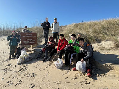 Scouts at border of Back Bay National Wildlife Refuge and and False Cape State Park