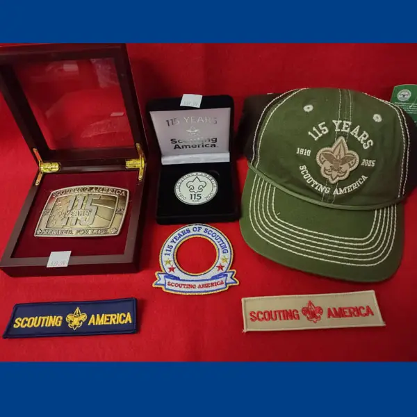 Scouting America cap, coin, belt buckle, World Crest ring, and uniform strips